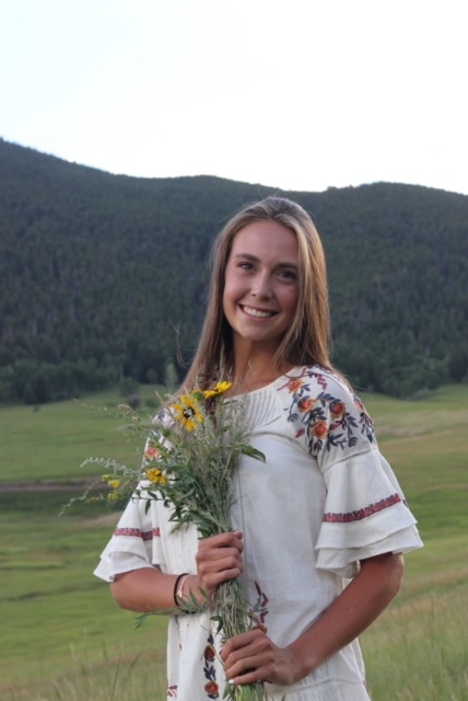 a picture of myself holding flowers